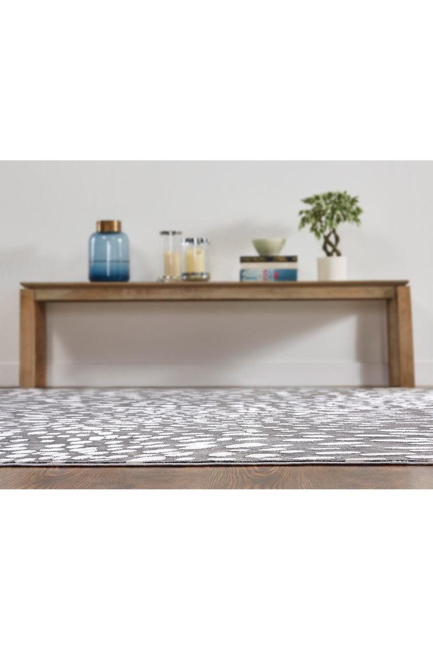 Buy Serengeti- Charcoal Spotted Rug in Grey Online Grey