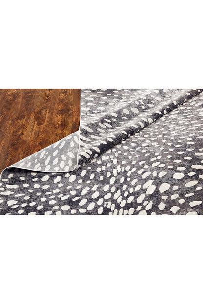 Buy Serengeti- Charcoal Spotted Rug in Grey Online Grey