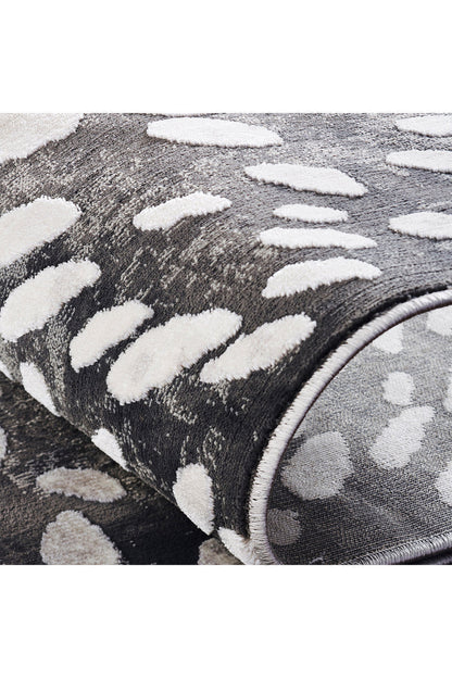Buy Serengeti- Charcoal Spotted Rug in Grey Online Grey